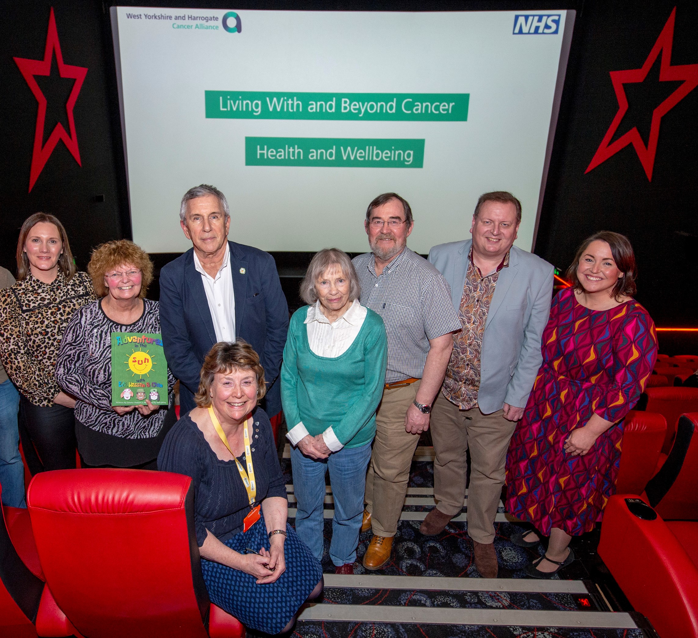 Patients on the steps at the cinema event