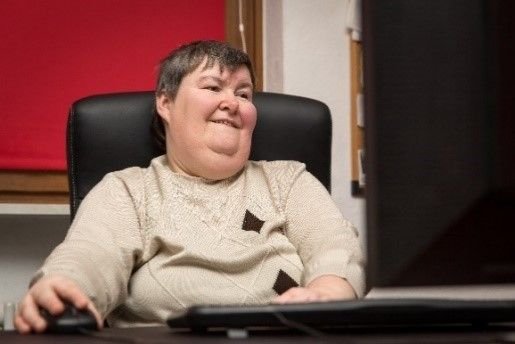 Woman using assistive technology