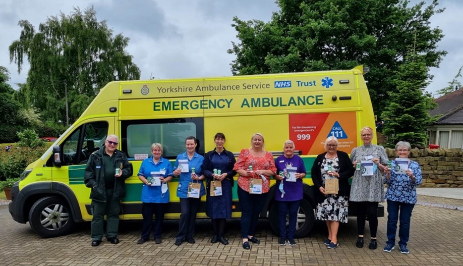 Ambulance and health and care staff with Message in a Bottle resources