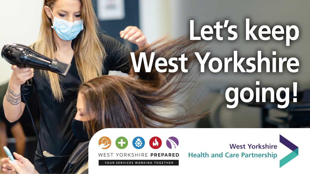 "Let's keep West Yorkshire going" hairdresser working wearing a protective mask