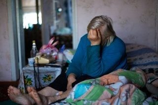 Elderly lady living in poor housing