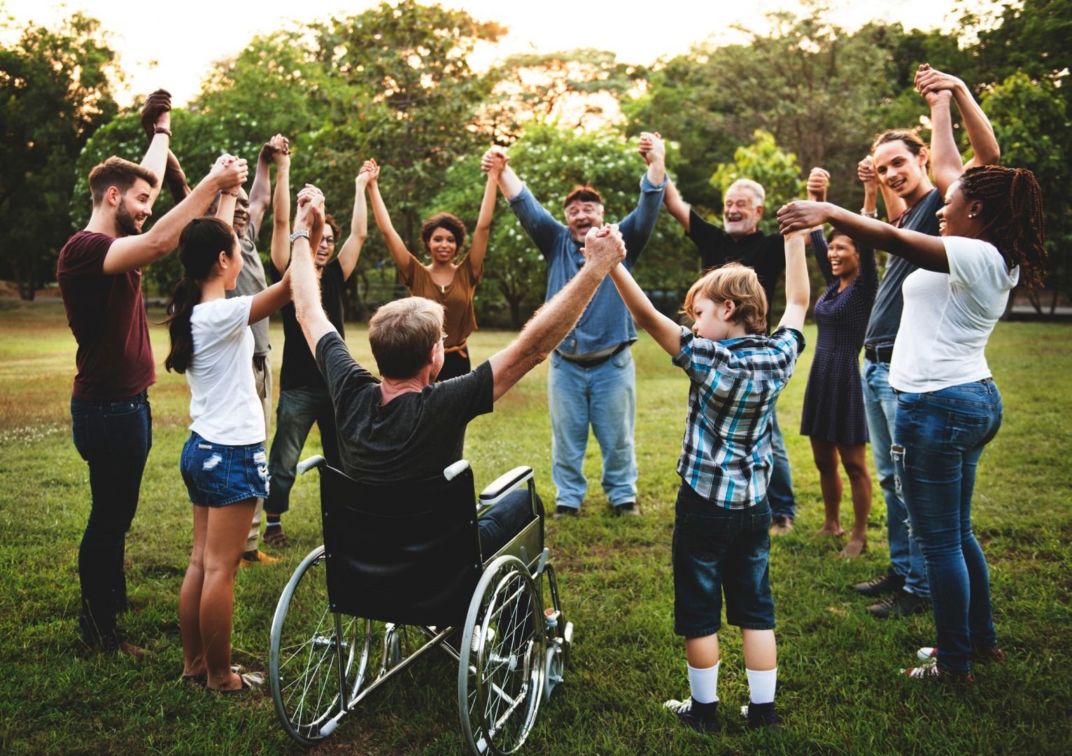 a group of people holding hands