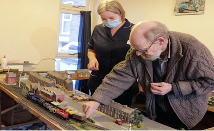 Alan at St Gemmas with his train set and Nicky