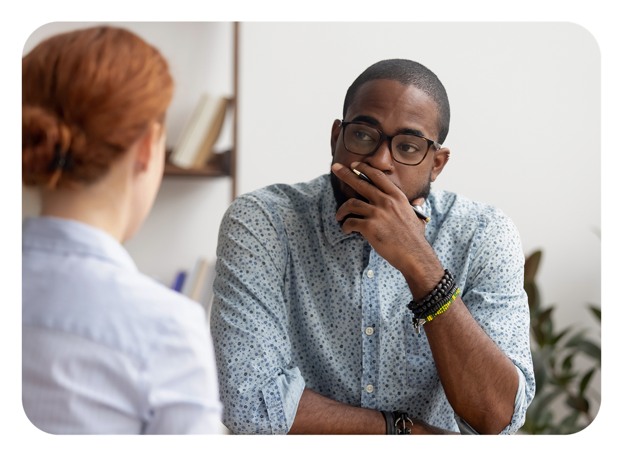 Manager listening to employee