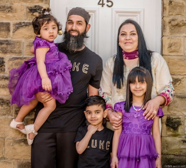 A West Yorkshire family outside their home