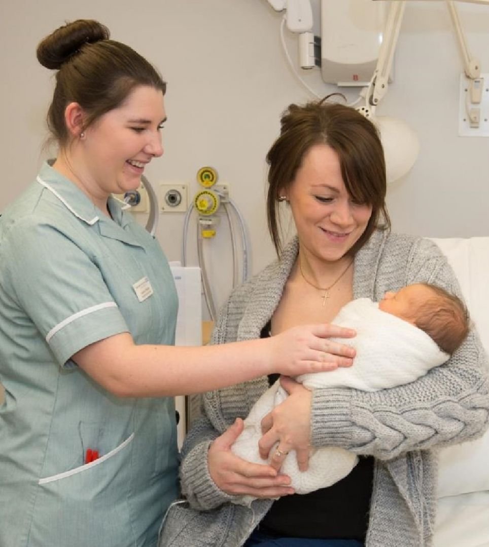 Image of nurse, new mum and baby