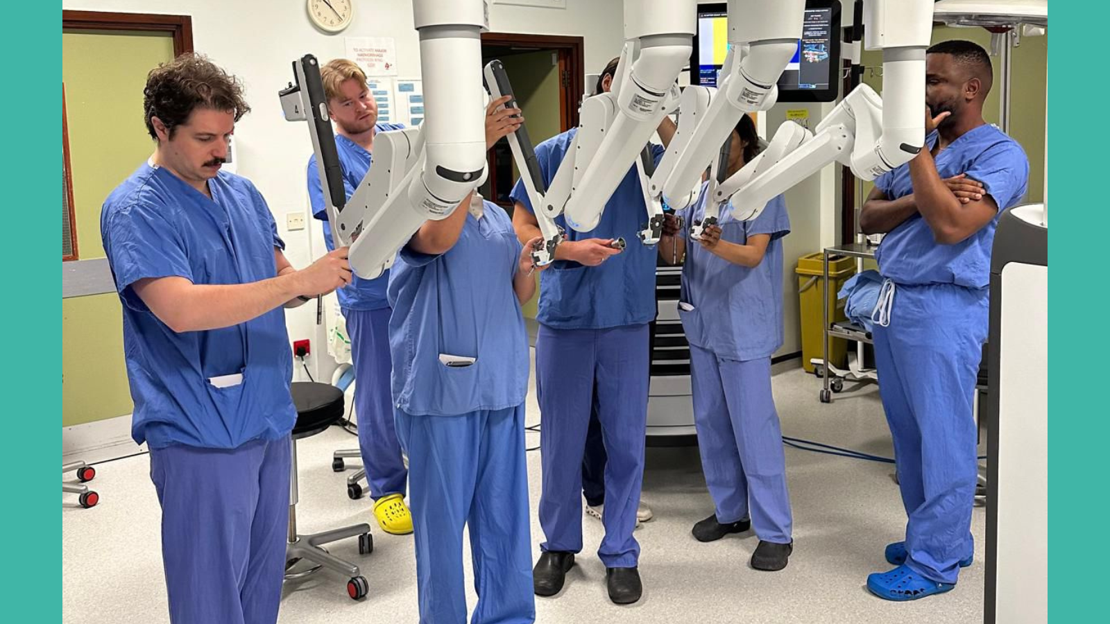 Image of medical staff with medical robots