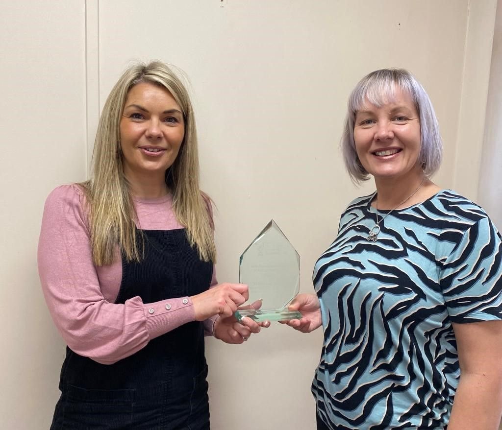 Dawn Greaves (right) handing award to Hayley Lockwood (left).jpg