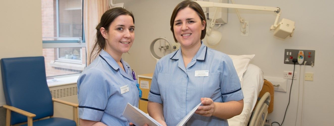 Two maternity nurses in uniform