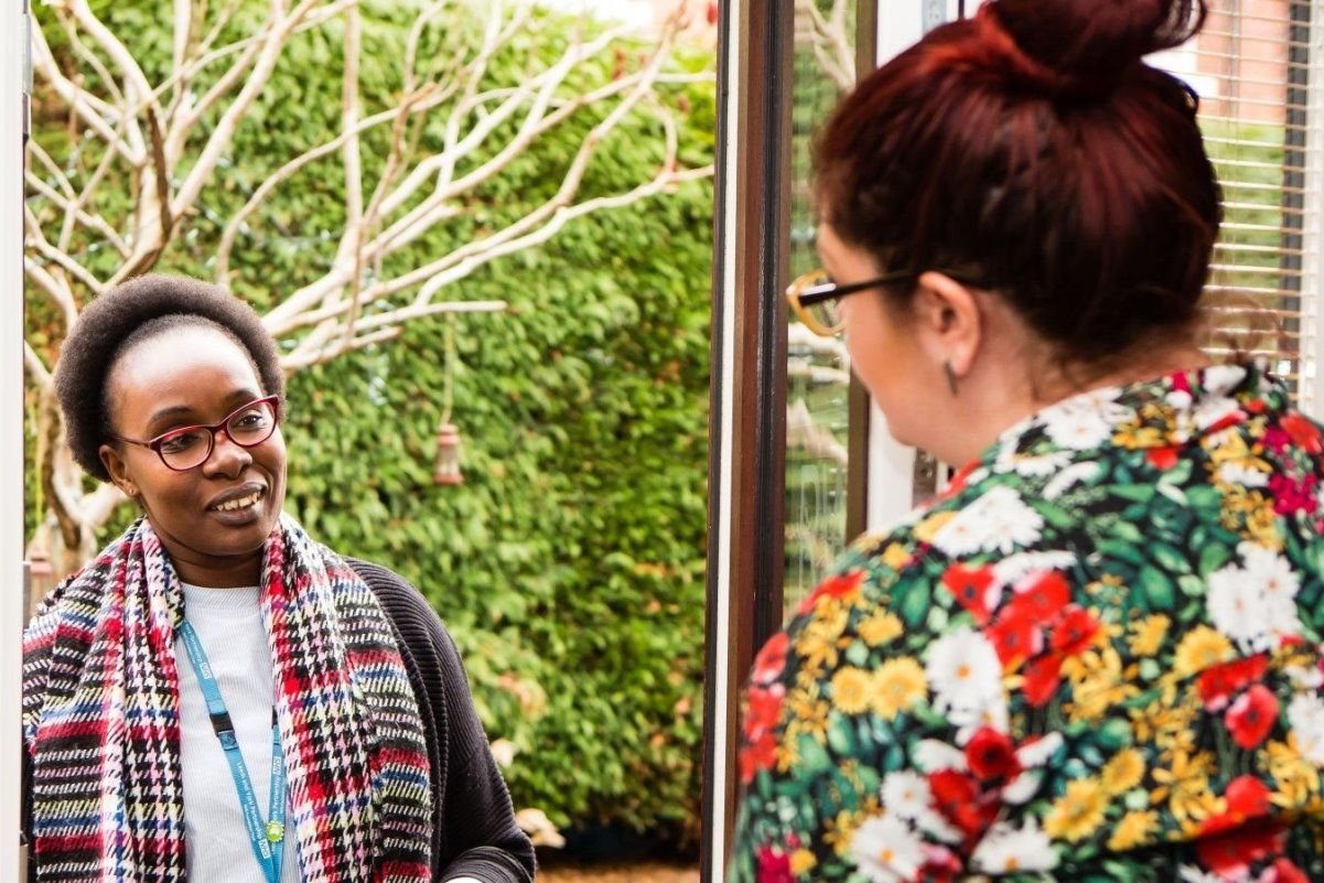 Local health and care staff on home visit