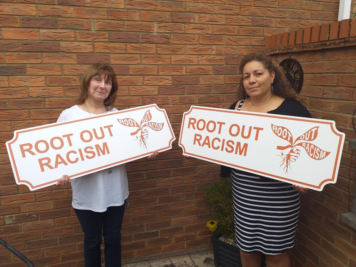 Root Out Racism wall