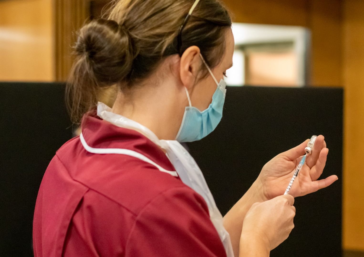 NHS nurse with vaccination