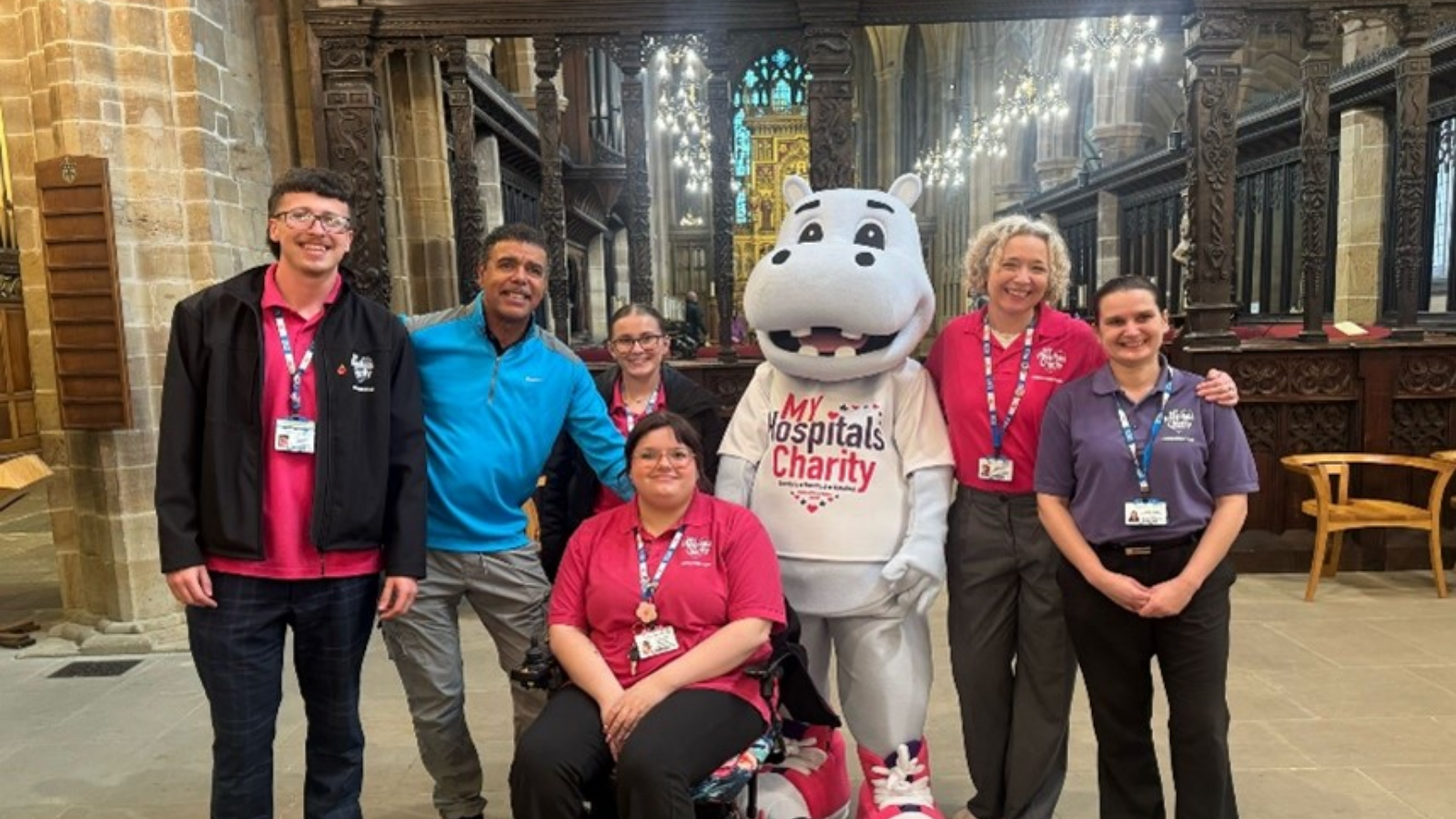 Image of group of people and hippo mascot