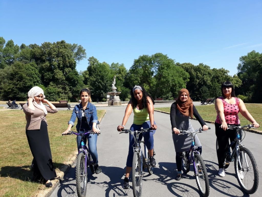 'Sisters United' refugee cycling group members on their bikes