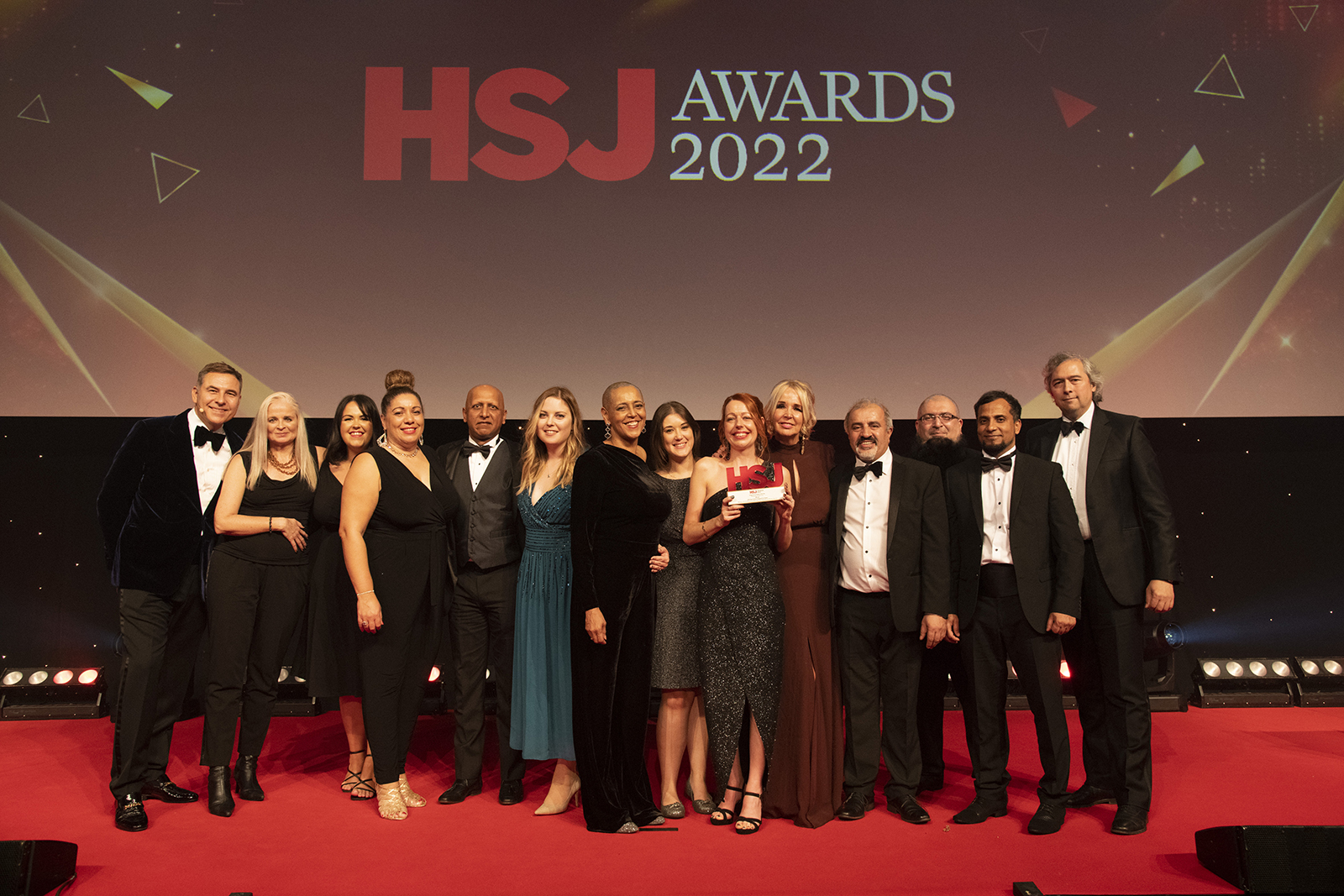 Partnership colleagues with the HSJ ICS of the year award