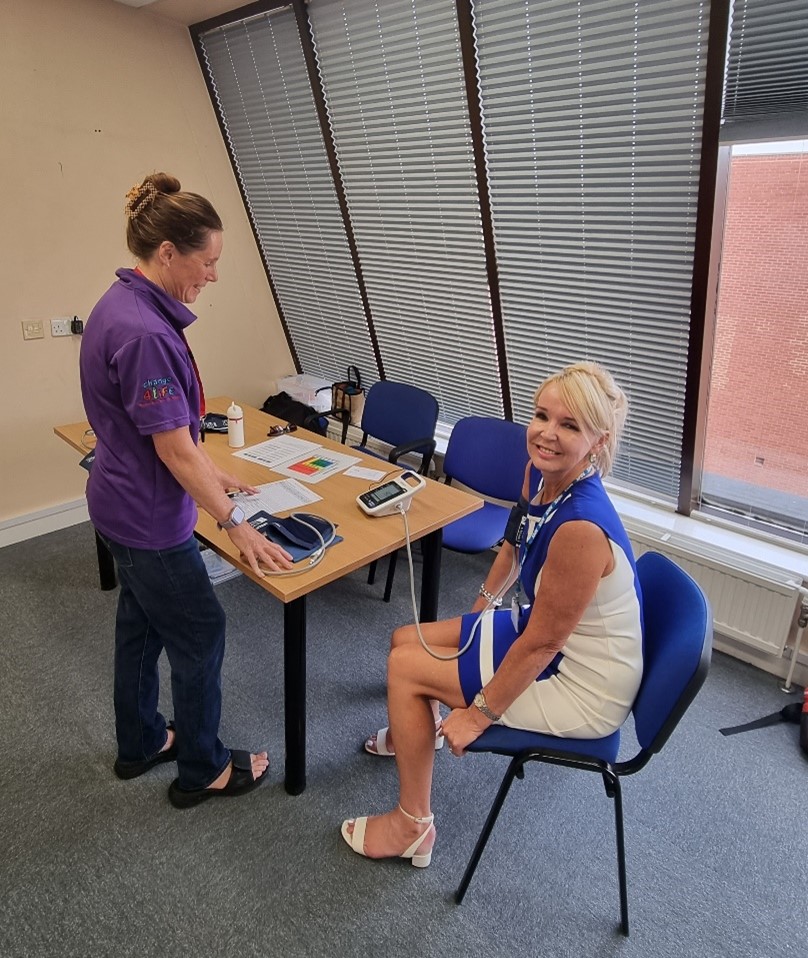 Karen Coleman having a BP check at White Rose House thanks to Wakefield Health Improvement team