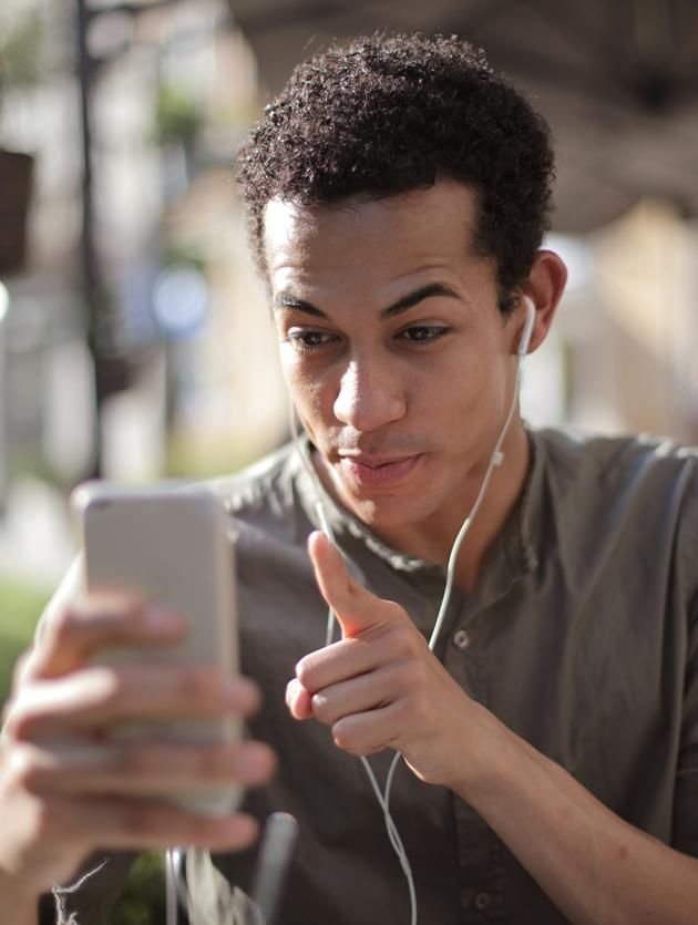 young man using smart phone