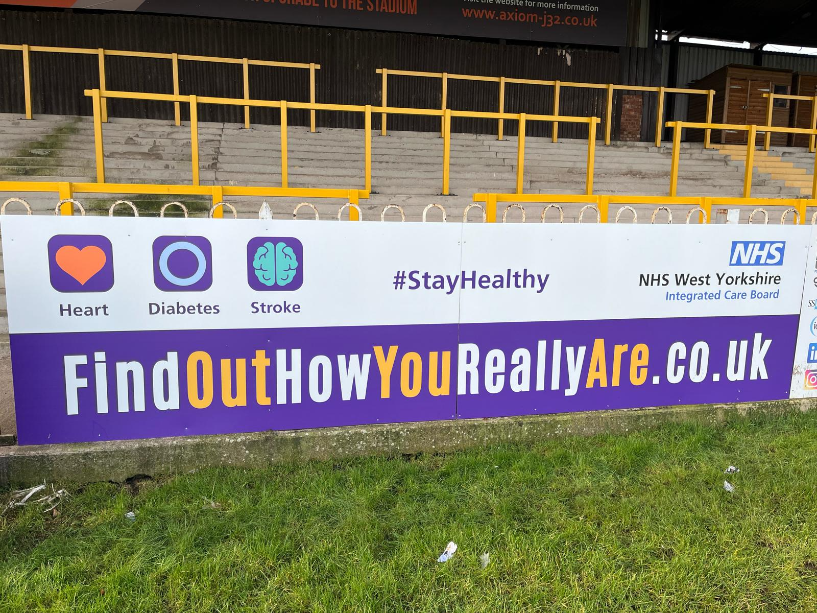 Find Out How You Really are pitch side board at Castleford Tigers stadium