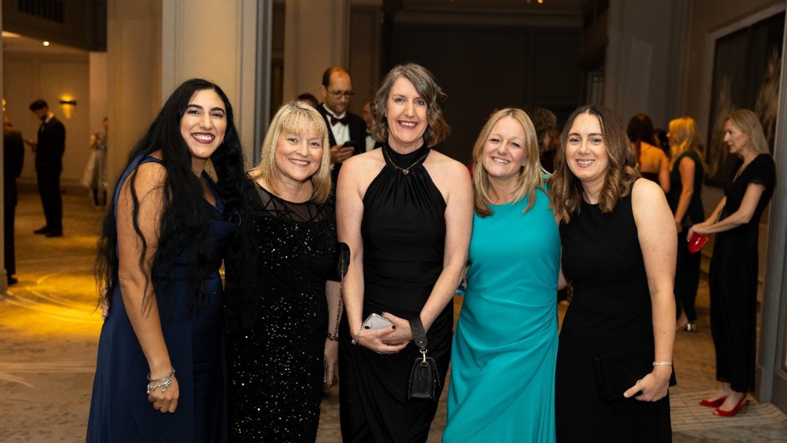 Image of group of women in formal clothes