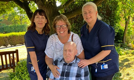 Julie and John with staff at Wakefield Hospice