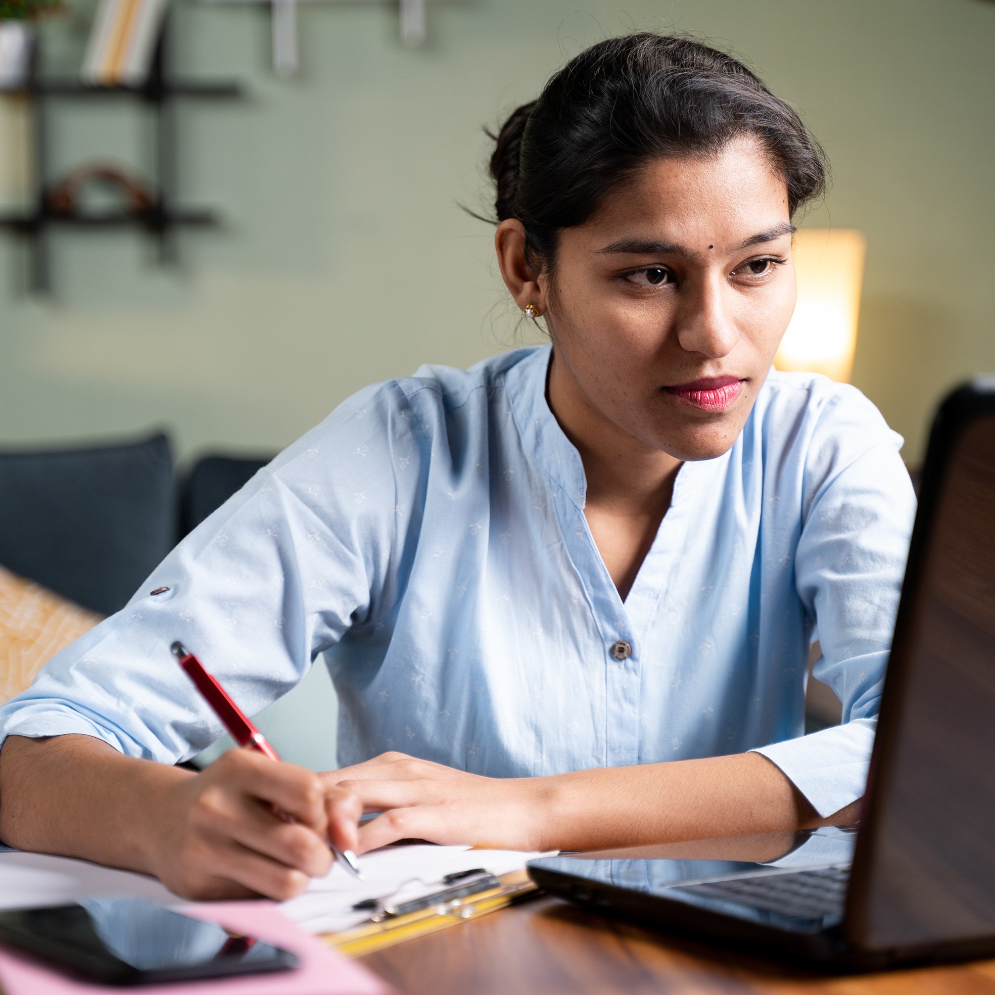 Young woman undertaking online training