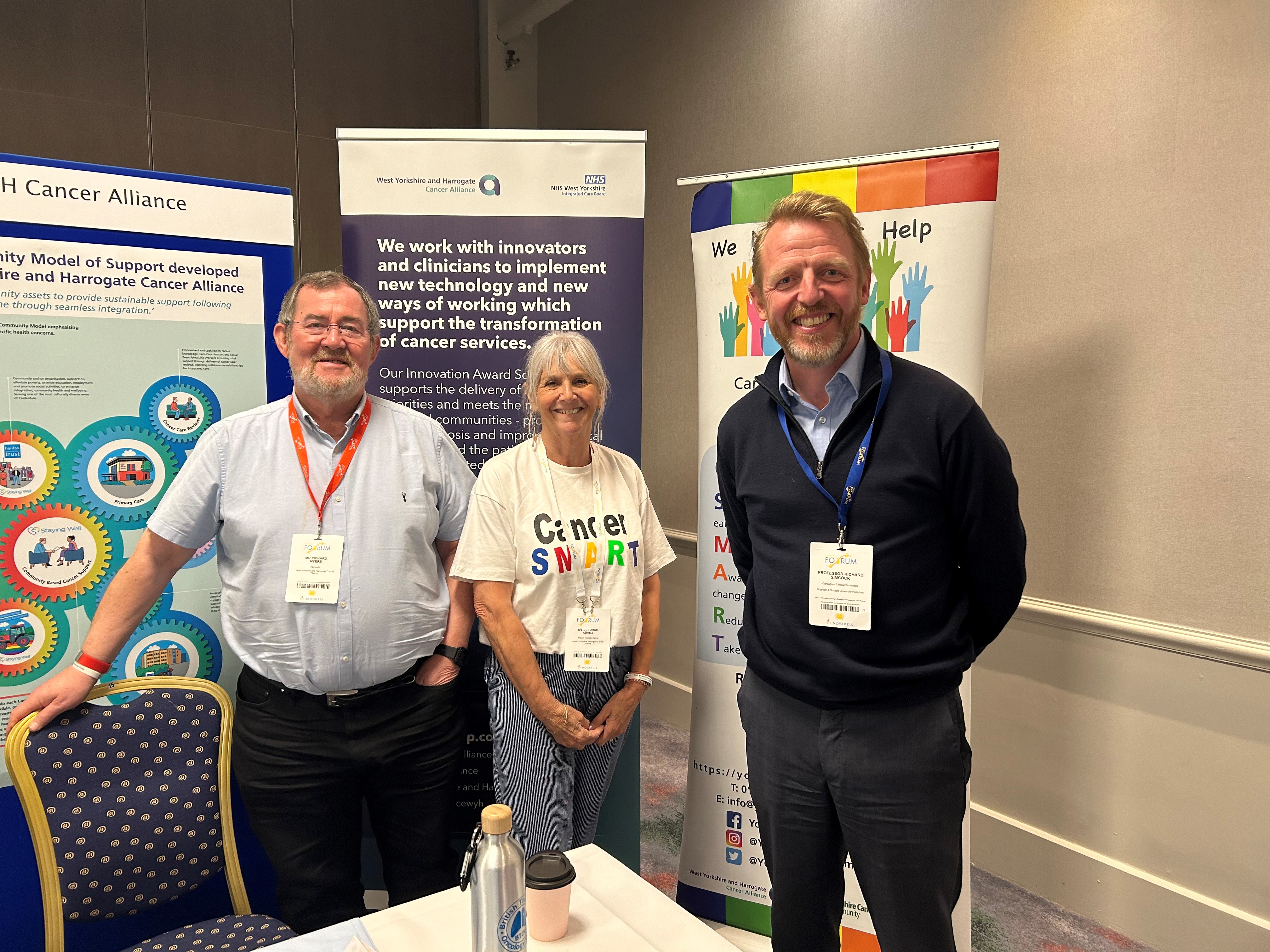 Ric Myers, Deborah Adams Richard and Simcox at the Oncology Forum 2024